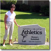 Coach Roz Goldenberg with commemorative rock